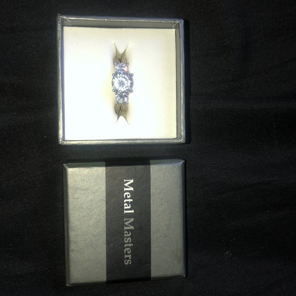 Metal master size 8 diamond ring